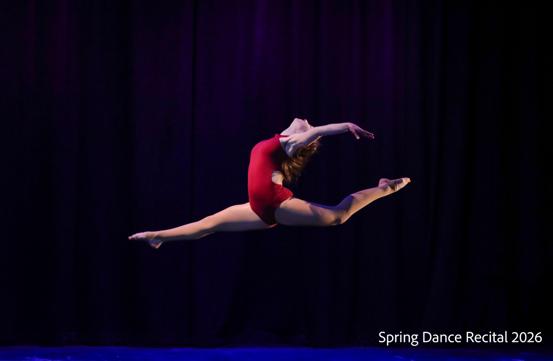 Storm King School dancer leaping on stage