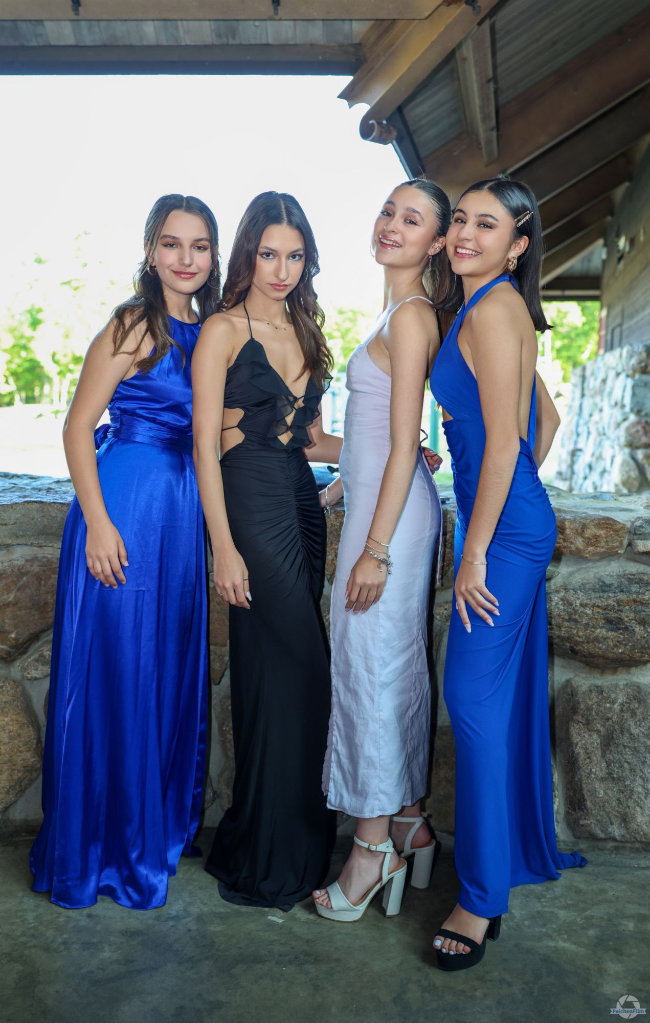 Four Storm King students dressed up for a formal evening