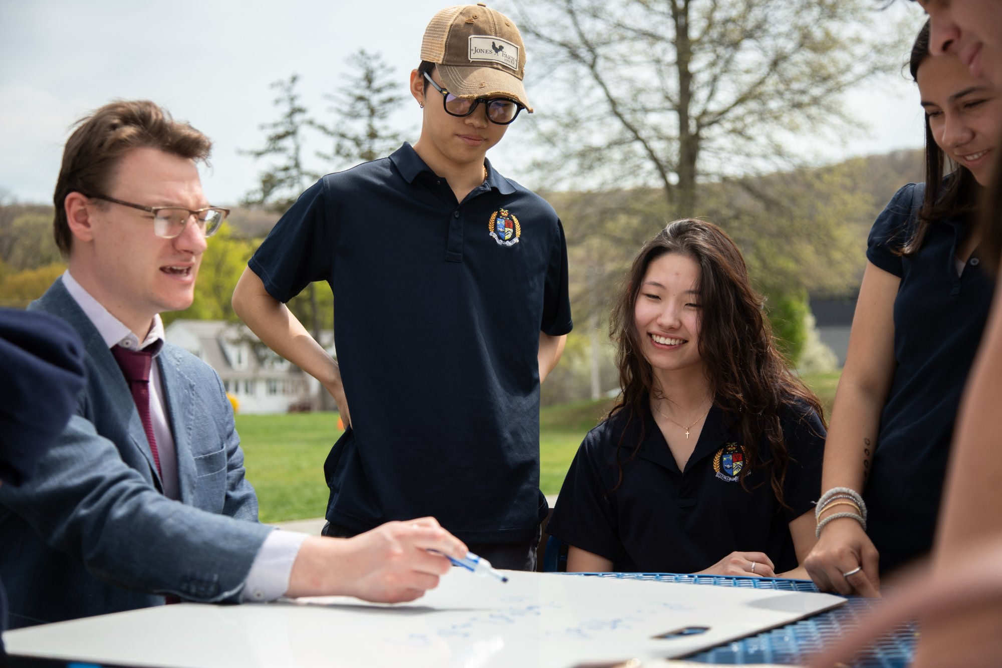 Diverse students engaged in collaborative learning at Storm King School
