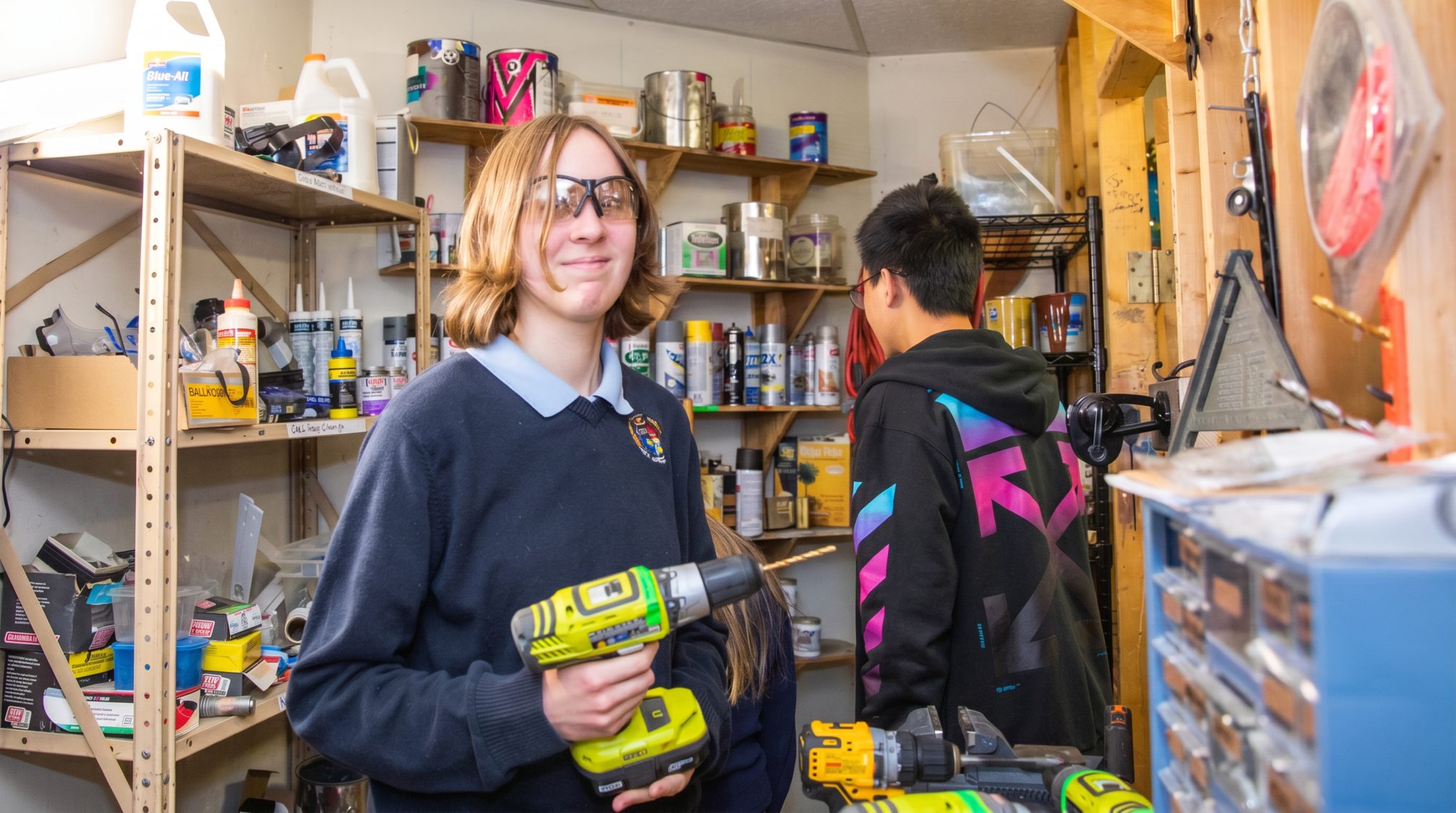A student builds scenery in the Storm King scene shop