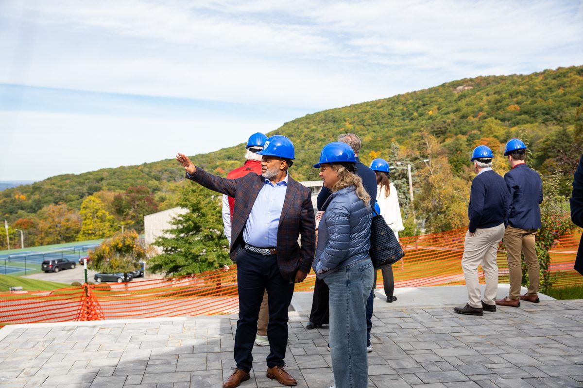 Storm King Trustees discuss possibilities for future campus improvements from the Fischer Academic Center terrace