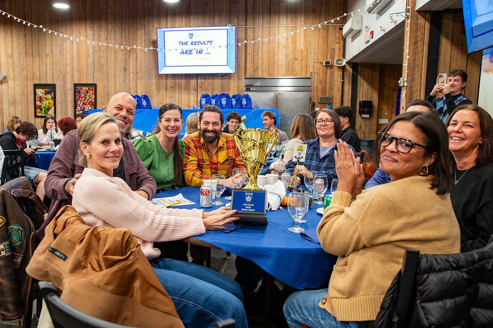 Families celebrate at Storm King Trivia Night in the gym during Fall Family Weekend